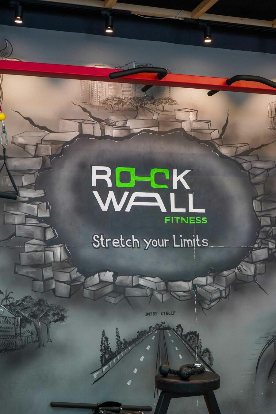 Rockwall graffiti wall reading stretch your limits